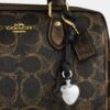 Bolso bandolera Mini Rowan en Signature Canvas con Charms