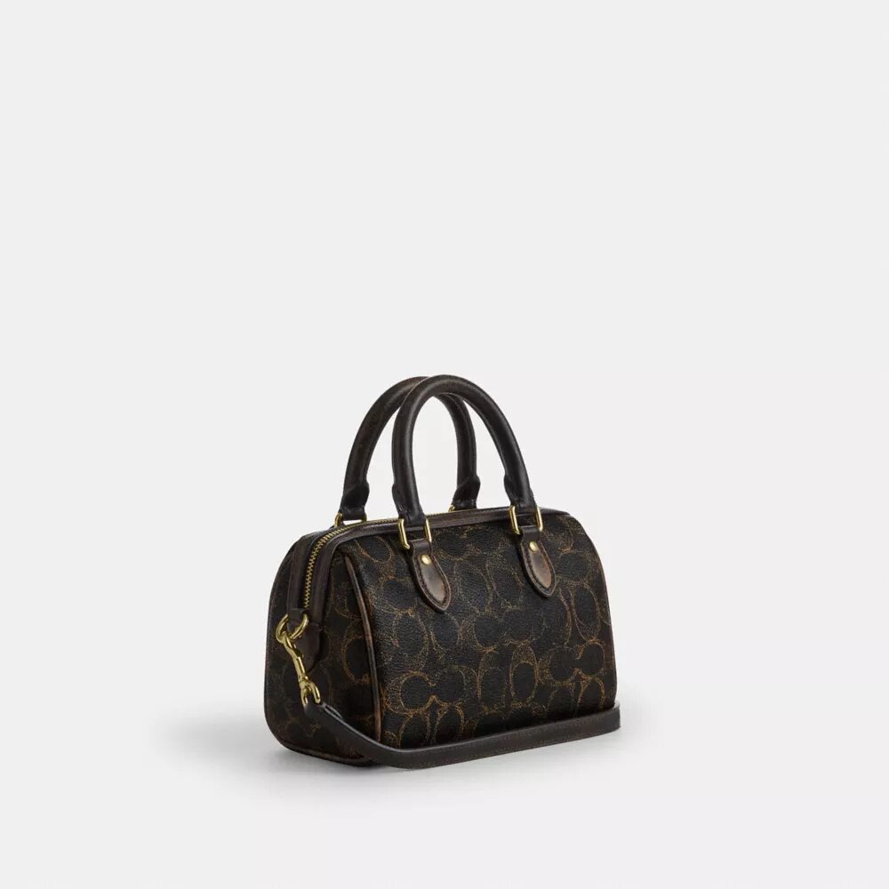 Bolso bandolera Mini Rowan en Signature Canvas con Charms