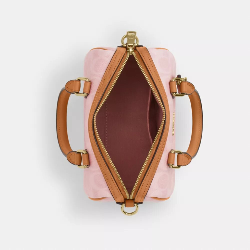 Bolso bandolera Mini Rowan en Signature Canvas con Charms