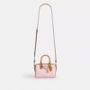 Bolso bandolera Mini Rowan en Signature Canvas con Charms