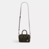 Bolso bandolera Mini Rowan en Signature Canvas con Charms