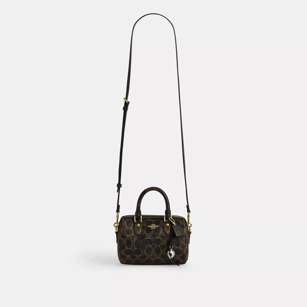 Bolso bandolera Mini Rowan en Signature Canvas con Charms