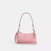 Bolso bandolera mini Teri en piel exclusiva con colgante de corazón