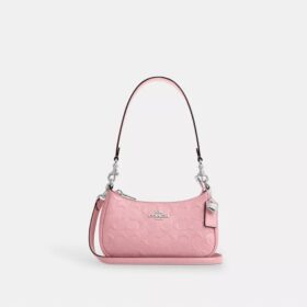 Bolso bandolera mini Teri en piel exclusiva con colgante de corazón