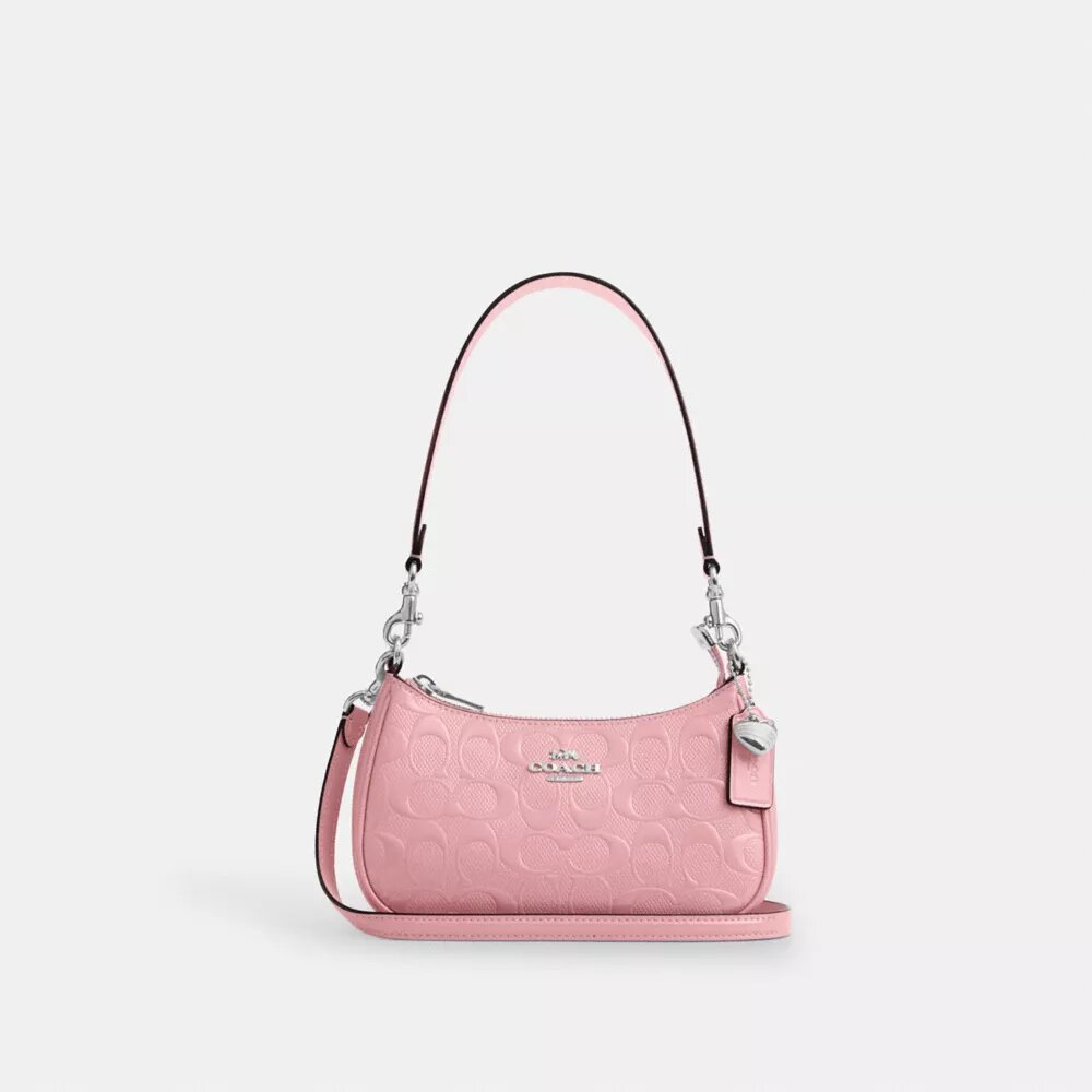 Bolso bandolera mini Teri en piel exclusiva con colgante de corazón