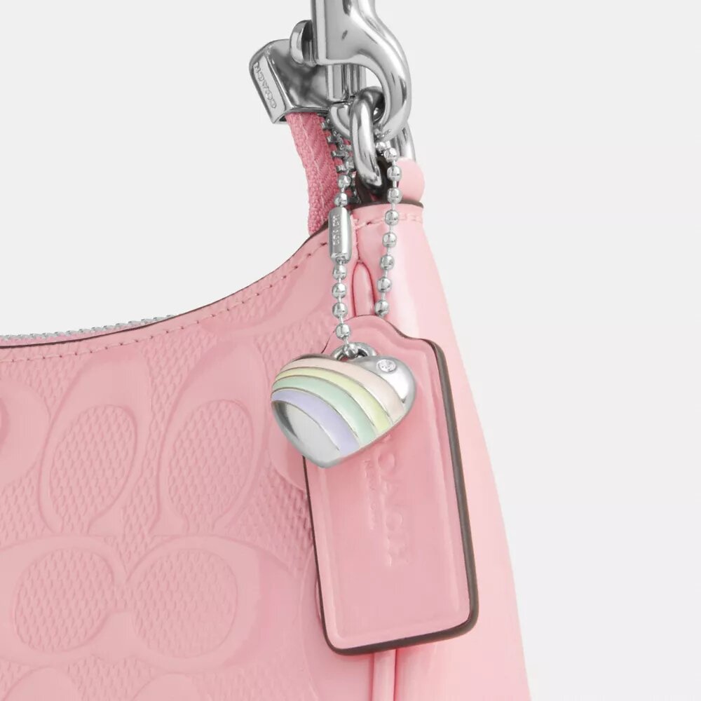 Bolso bandolera mini Teri en piel exclusiva con colgante de corazón