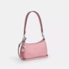 Bolso bandolera mini Teri en piel exclusiva con colgante de corazón