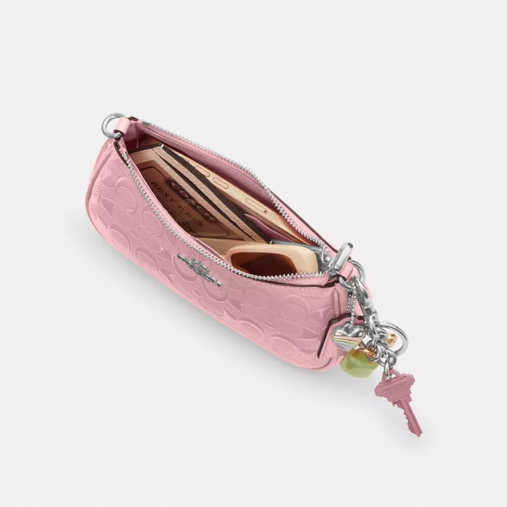 Bolso bandolera mini Teri en piel exclusiva con colgante de corazón