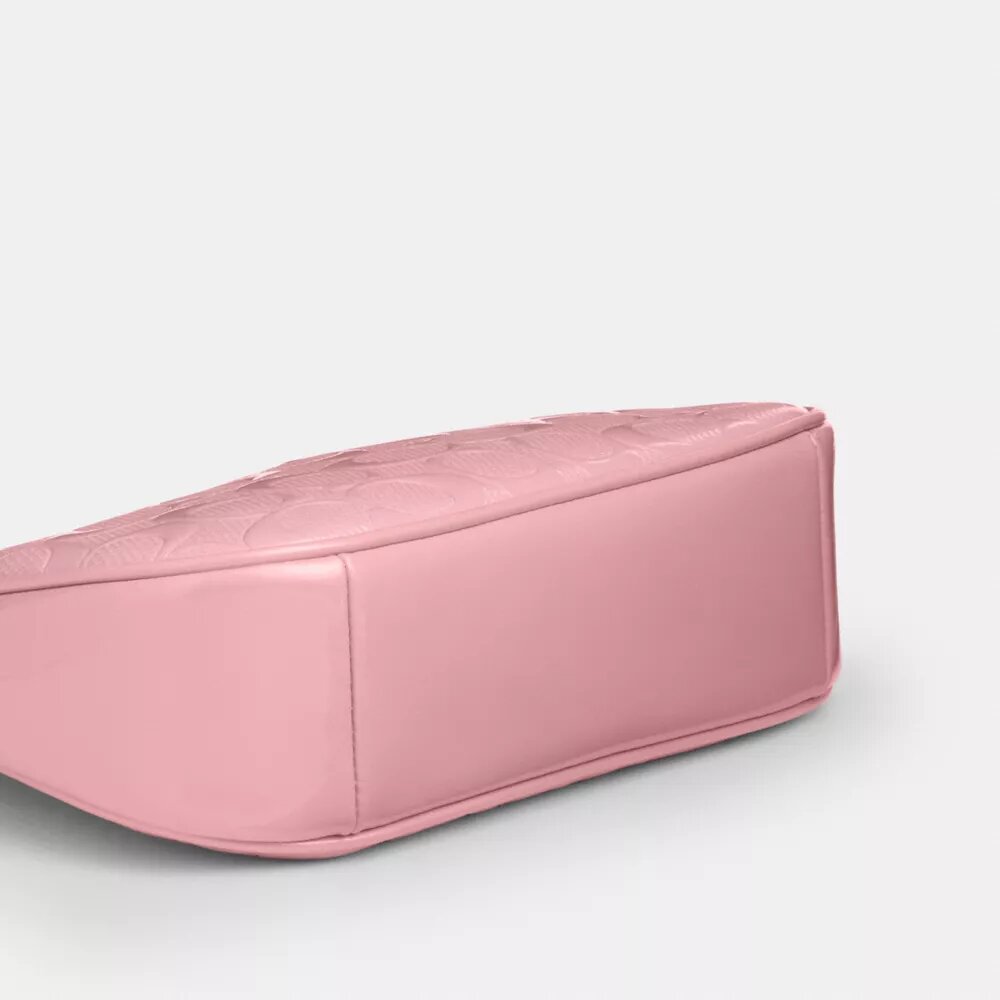 Bolso bandolera mini Teri en piel exclusiva con colgante de corazón