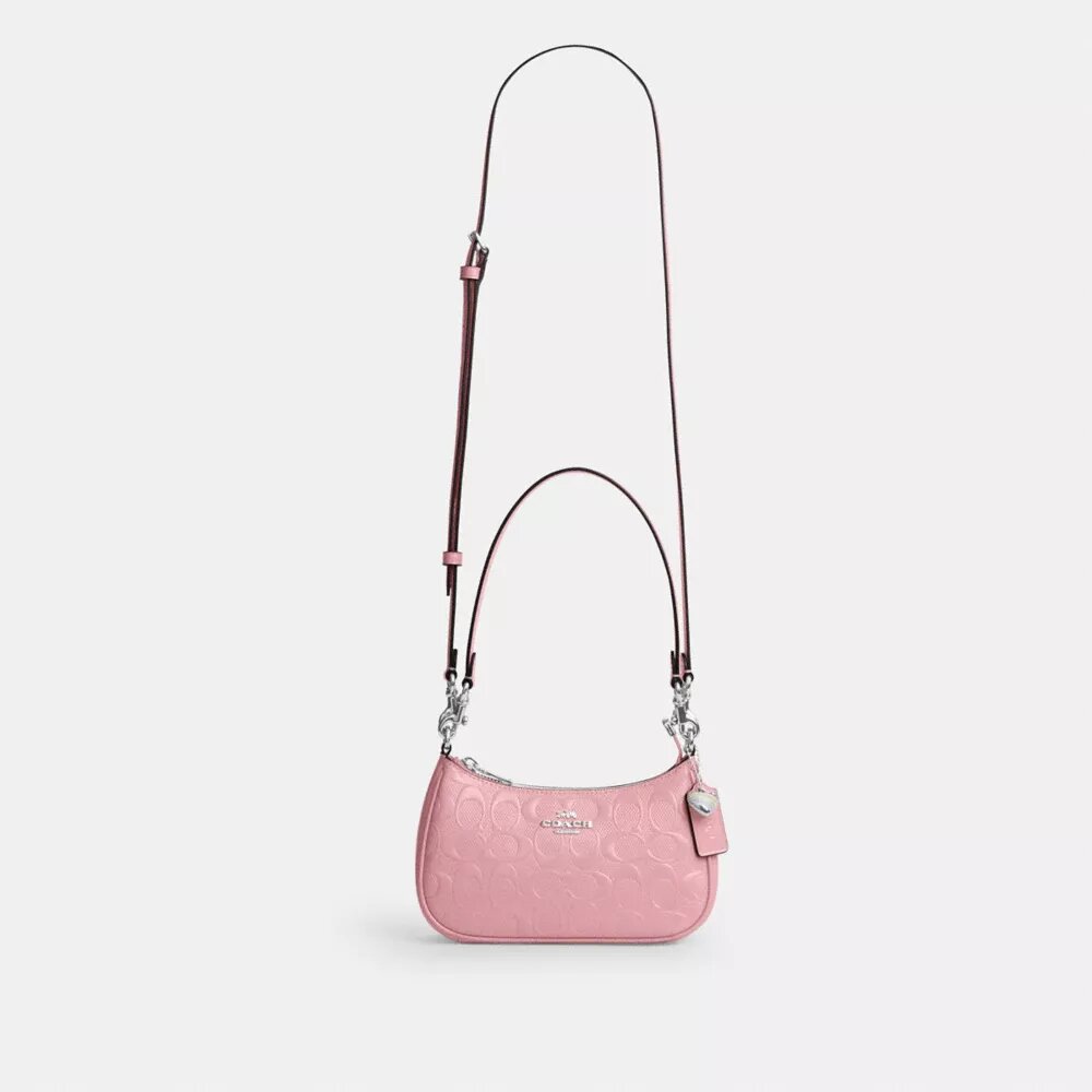 Bolso bandolera mini Teri en piel exclusiva con colgante de corazón
