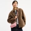 Bolso bandolera mini Teri en piel exclusiva con colgante de corazón