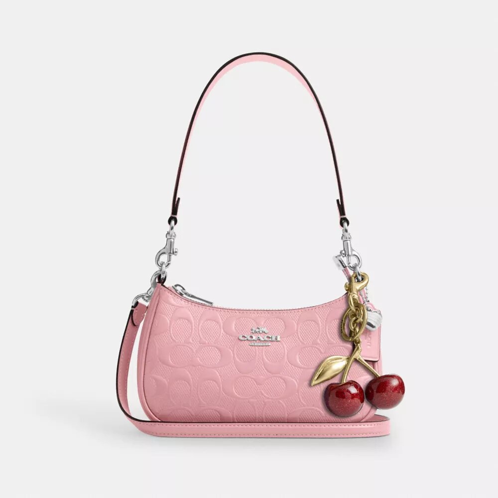 Bolso bandolera mini Teri en piel exclusiva con colgante de corazón