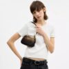 Bolso bandolera mini Teri en Signature Canvas