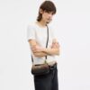 Bolso bandolera mini Teri en Signature Canvas
