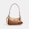 Bolso bandolera mini Teri en Signature Canvas