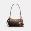 Bolso bandolera mini Teri en Signature Canvas