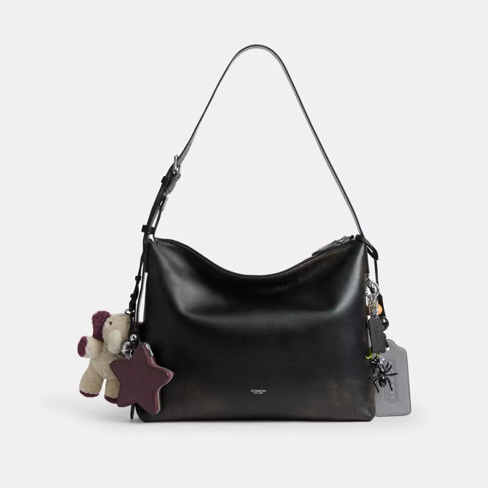 Bolso bandolera Mott 38 en cuero desgastado con Charms