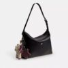 Bolso bandolera Mott 38 en cuero desgastado con Charms