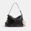 Bolso bandolera Mott 38 en cuero desgastado con Charms