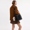 Bolso bandolera Mott 38 en cuero desgastado con Charms