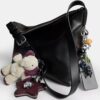 Bolso bandolera Mott 38 en cuero desgastado con Charms