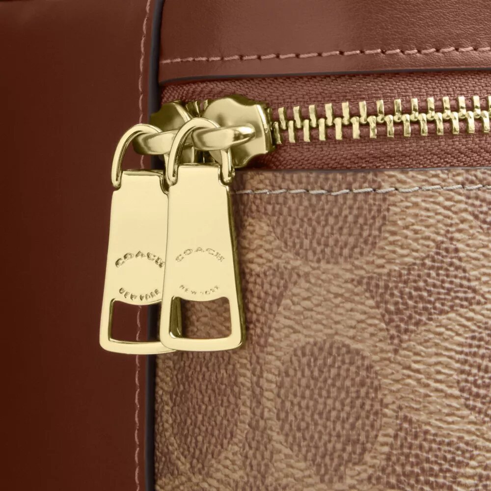 Bolso bandolera Rainer 18 en Signature Canvas