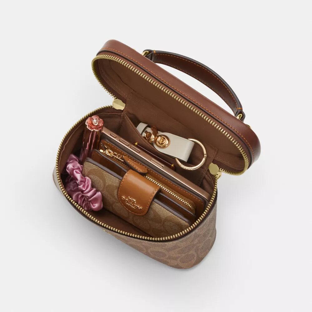 Bolso bandolera Rainer 18 en Signature Canvas