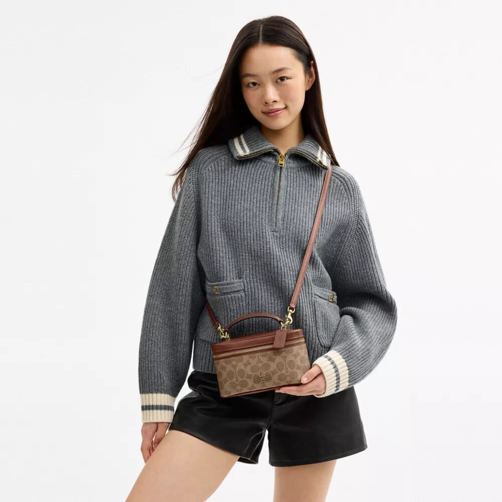 Bolso bandolera Rainer 18 en Signature Canvas