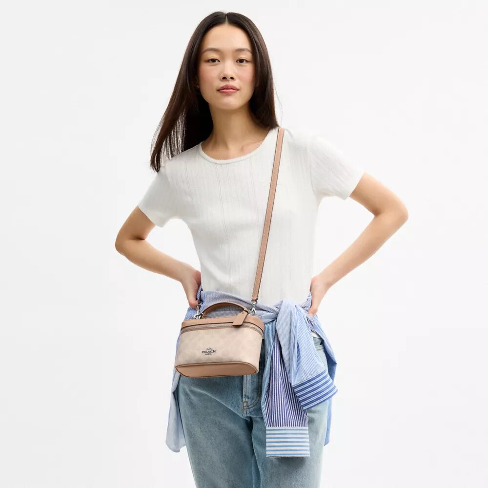 Bolso bandolera Rainer 18 en Signature Canvas
