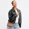 Bolso bandolera Rainer 18 en Signature Canvas