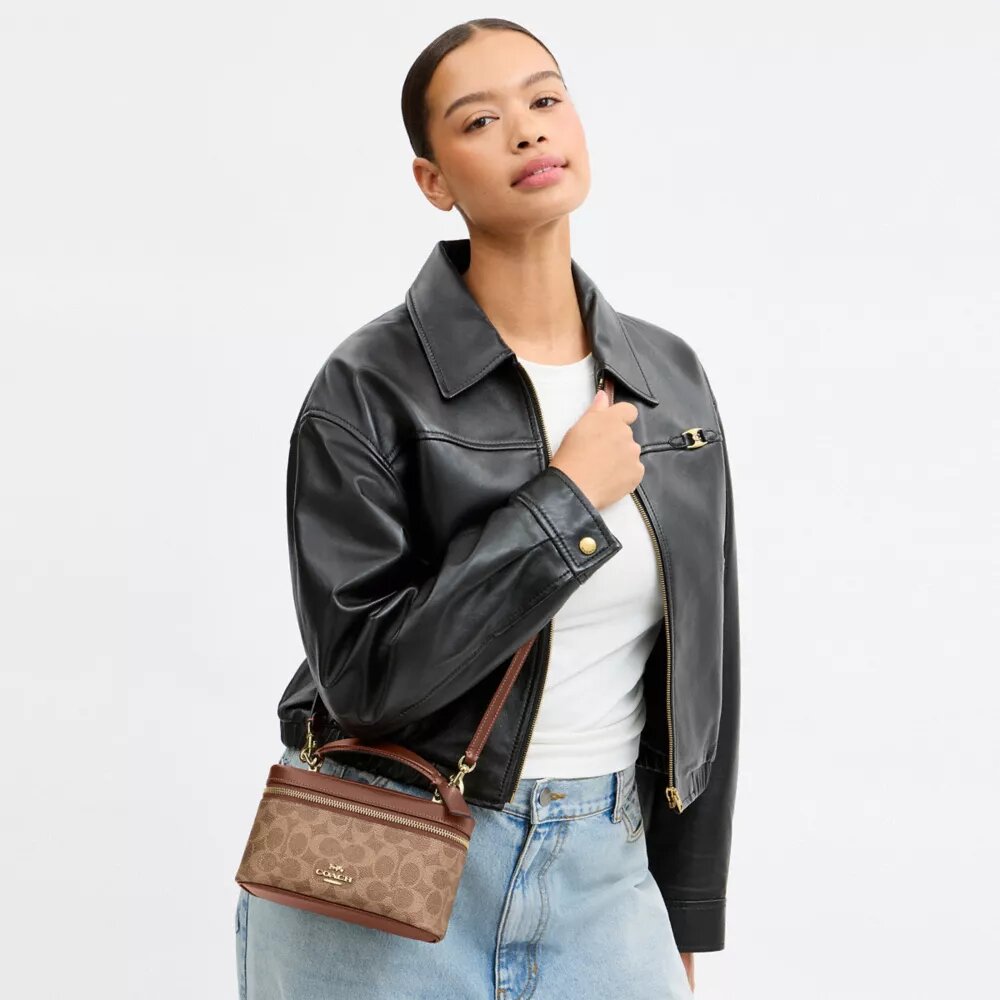 Bolso bandolera Rainer 18 en Signature Canvas