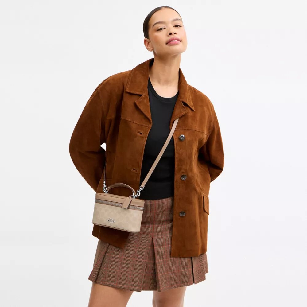 Bolso bandolera Rainer 18 en Signature Canvas