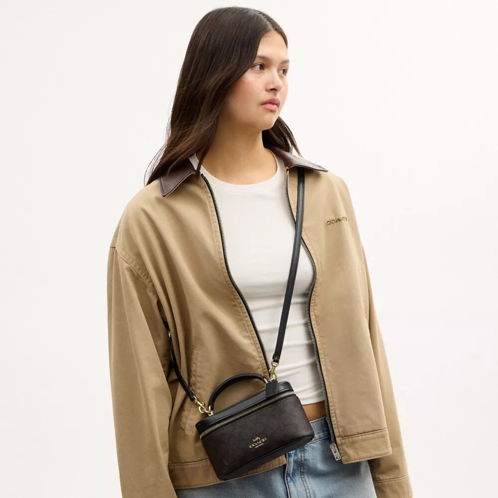 Bolso bandolera Rainer 18 en Signature Canvas