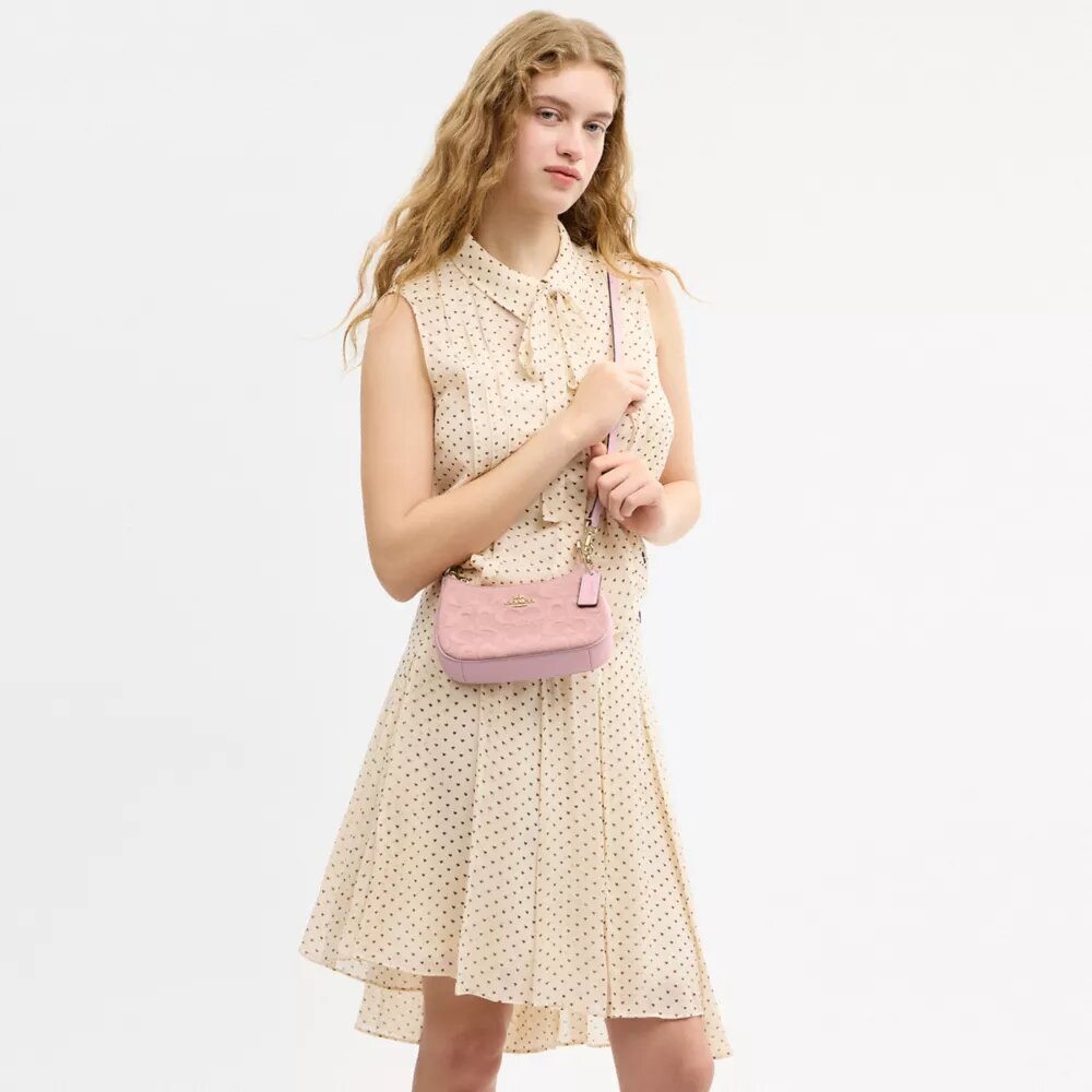 Bolso bandolera Teri Mini en denim exclusivo