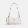 Bolso bandolera Teri Mini en Signature Canvas