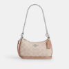 Bolso bandolera Teri Mini en Signature Canvas