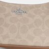 Bolso bandolera Teri Mini en Signature Canvas