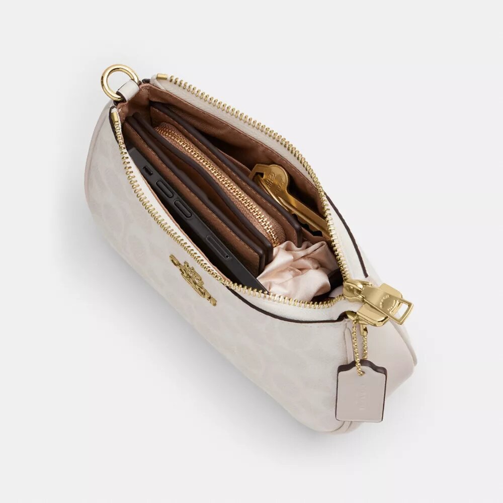 Bolso bandolera Teri Mini en Signature Canvas