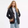 Bolso bandolera Teri Mini en Signature Canvas