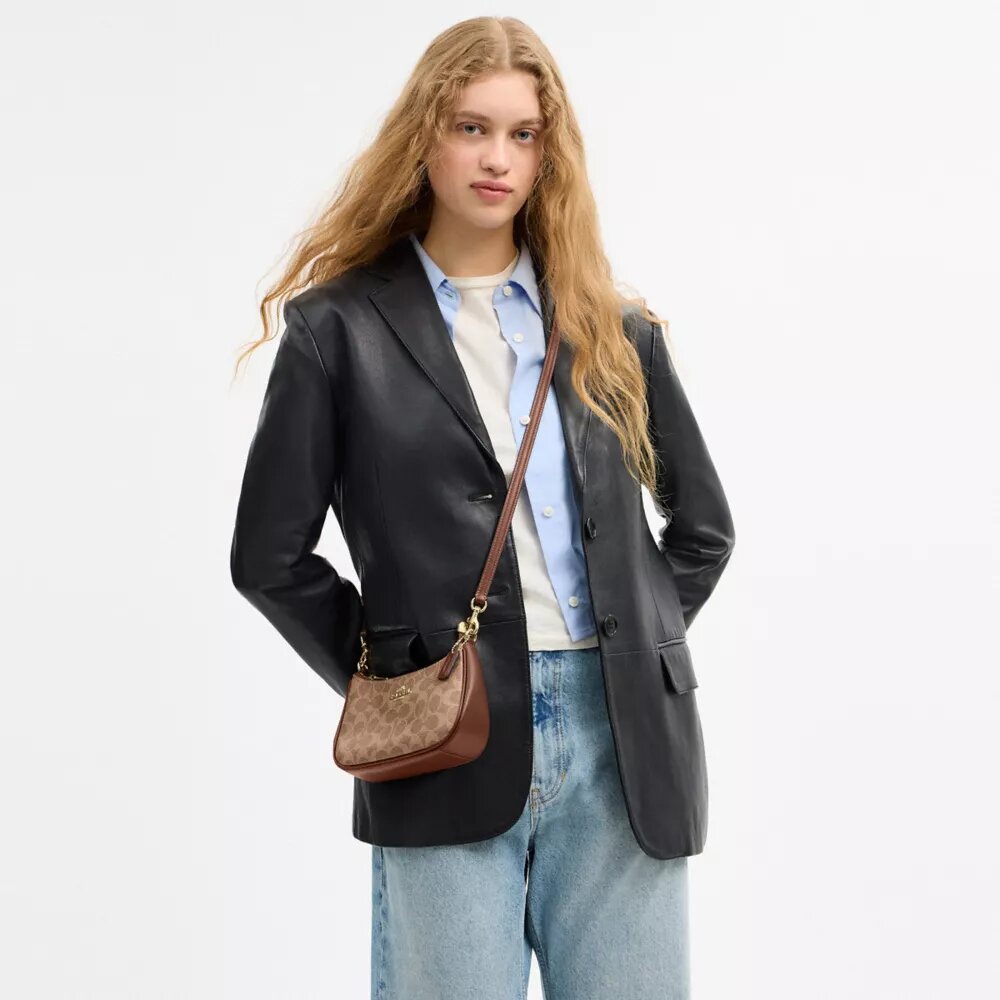 Bolso bandolera Teri Mini en Signature Canvas