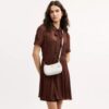 Bolso bandolera Teri Mini en Signature Canvas