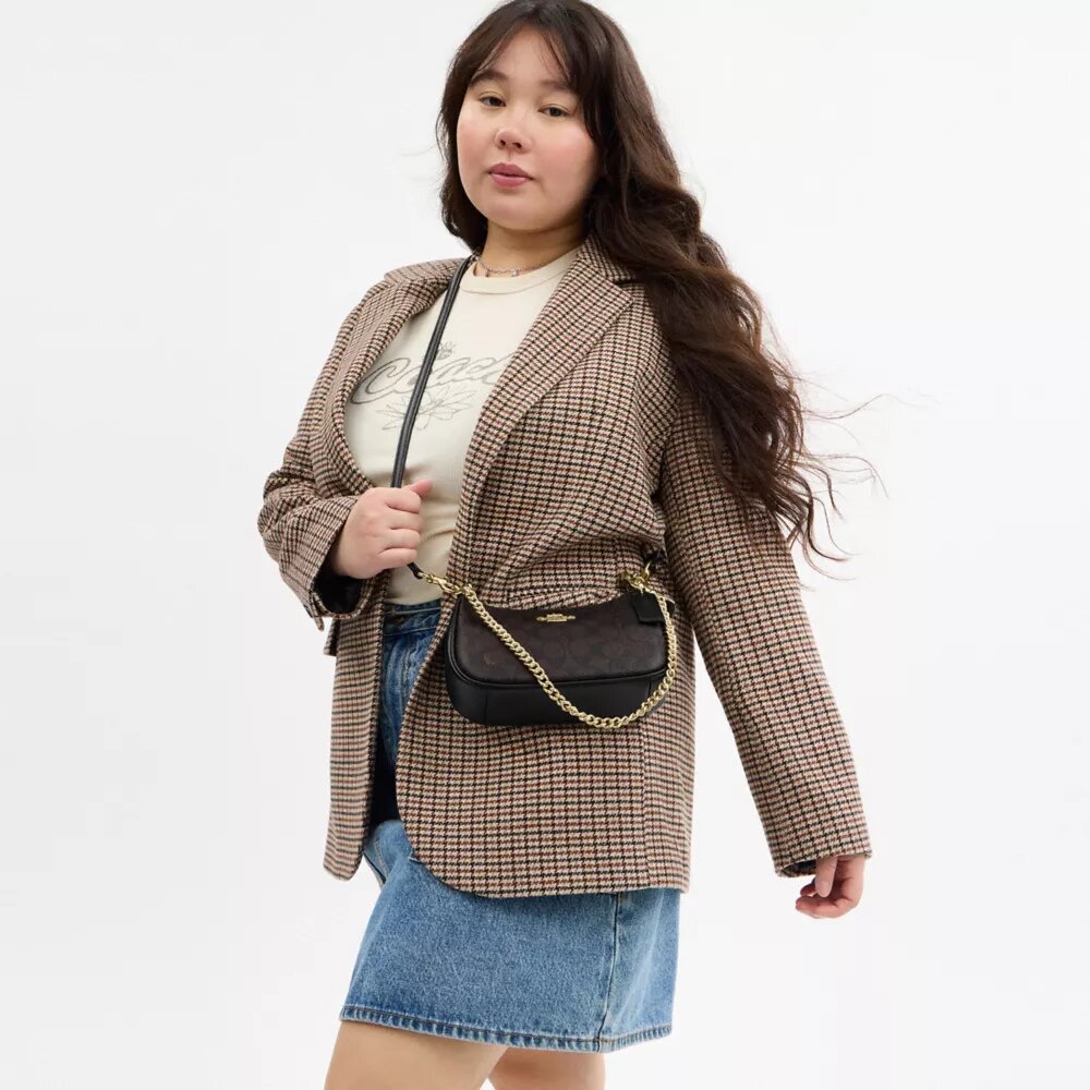 Bolso bandolera Teri Mini en Signature Canvas