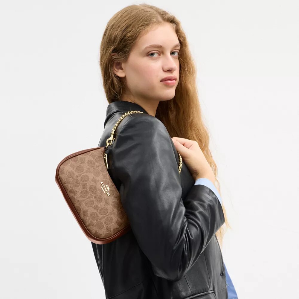 Bolso bandolera Teri Mini en Signature Canvas