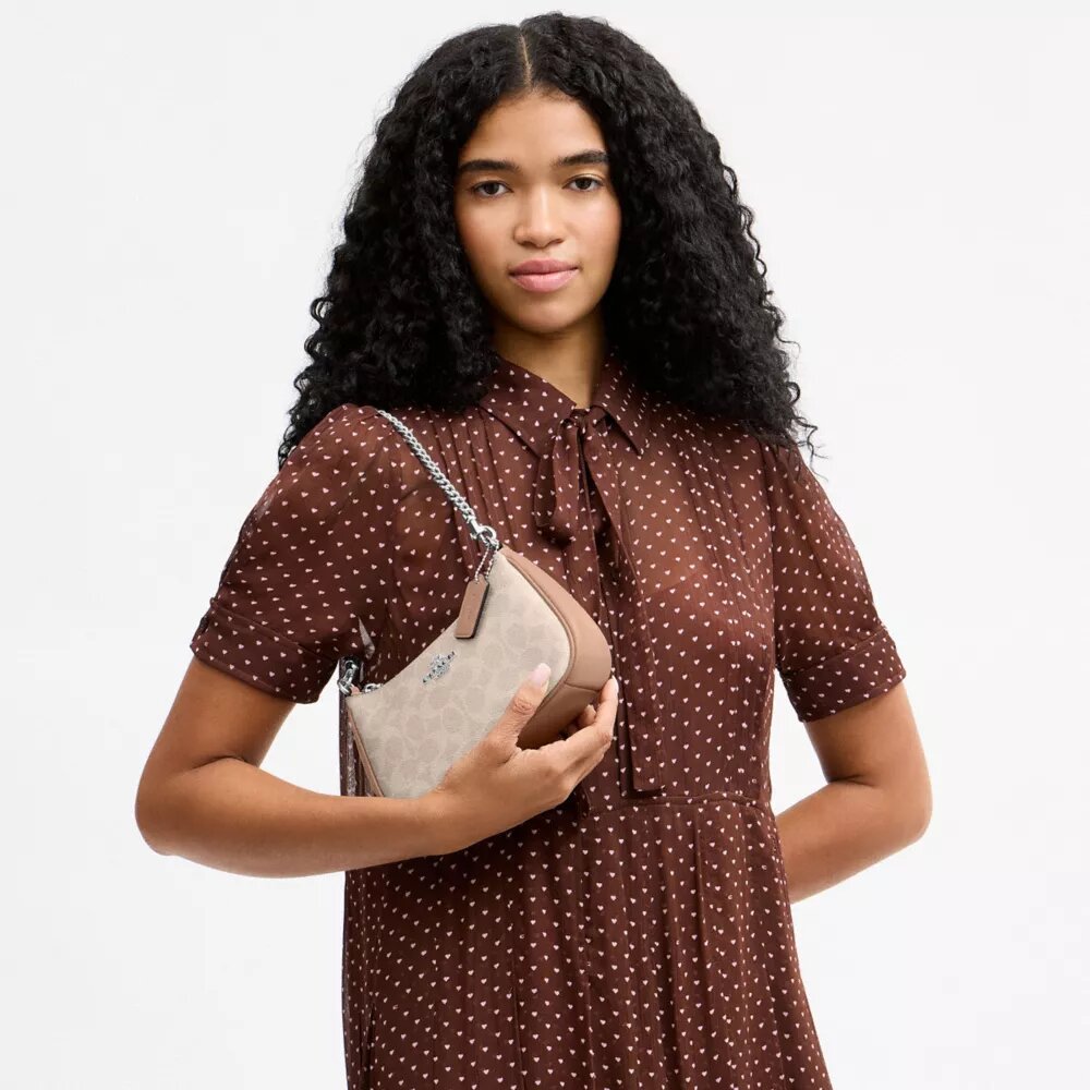 Bolso bandolera Teri Mini en Signature Canvas