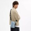 Bolso bandolera Tristan 14 en denim «Loved Signature» con Charms