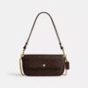 Bolso Brooke con solapa y cadena en Signature Canvas