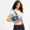 Bolso cilíndrico con cierre Kisslock de 28 en denim reciclado