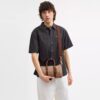 Bolso Compass 25 en Signature Canvas