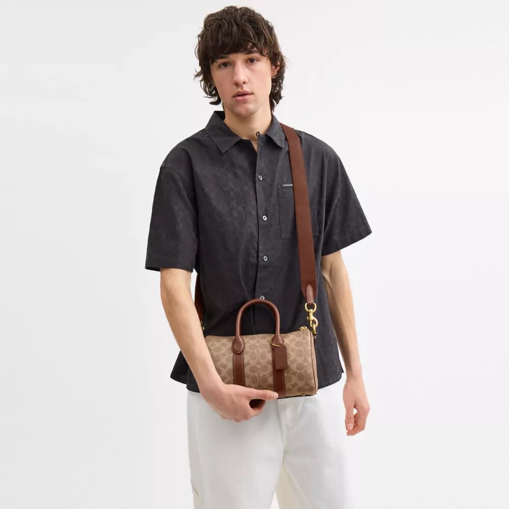 Bolso Compass 25 en Signature Canvas