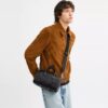 Bolso Compass 25 en Signature Canvas